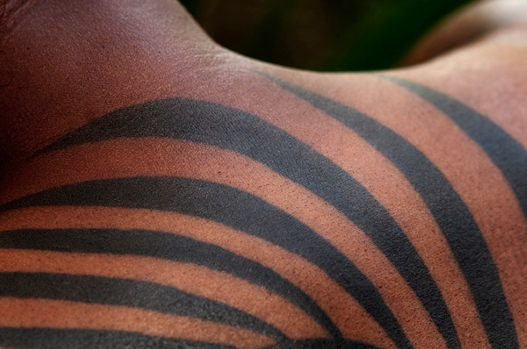 Bold black tattoo detail
